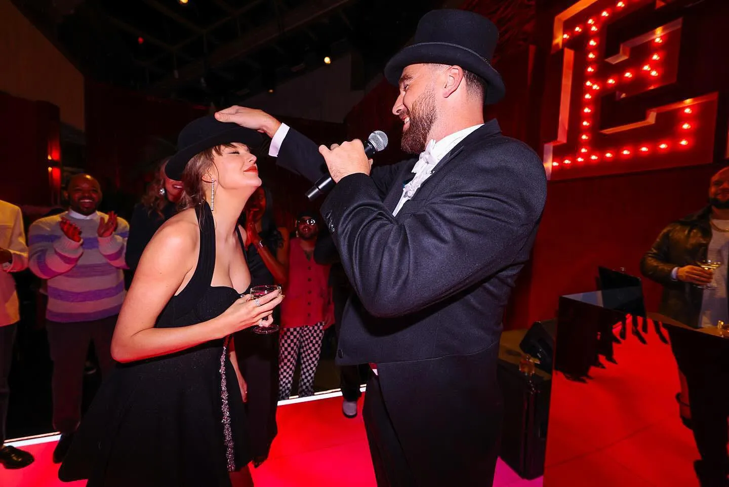 travis kelce adorably gifts girlfriend taylor swift 22 hat at eras tour themed party 489